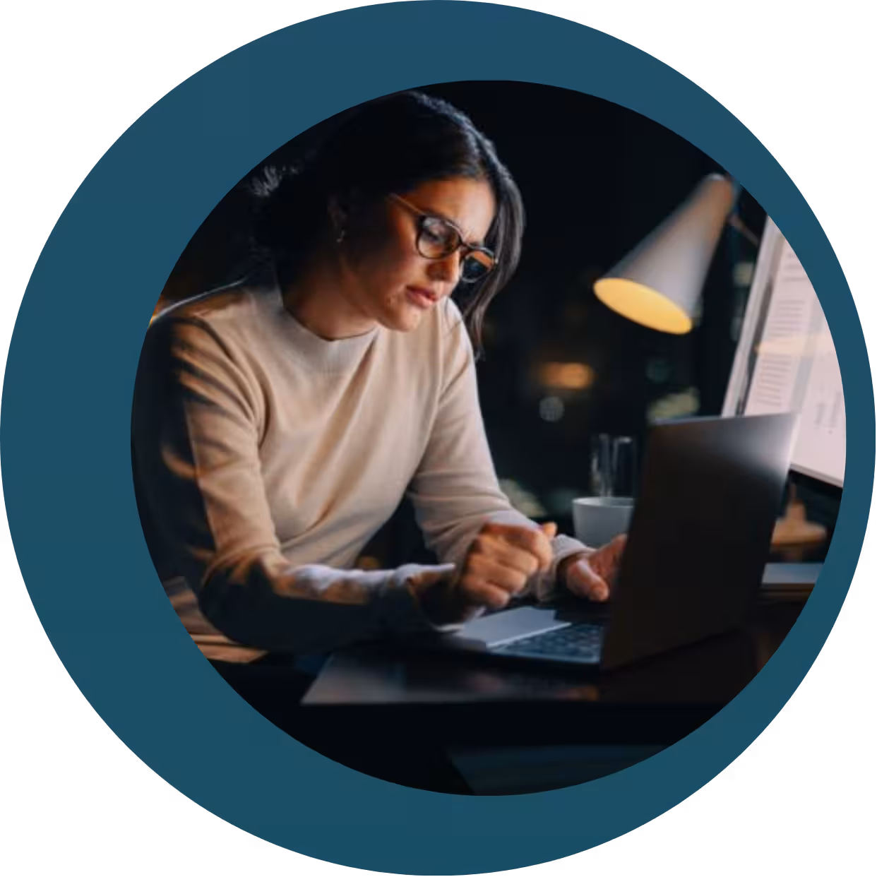Female on computer at night